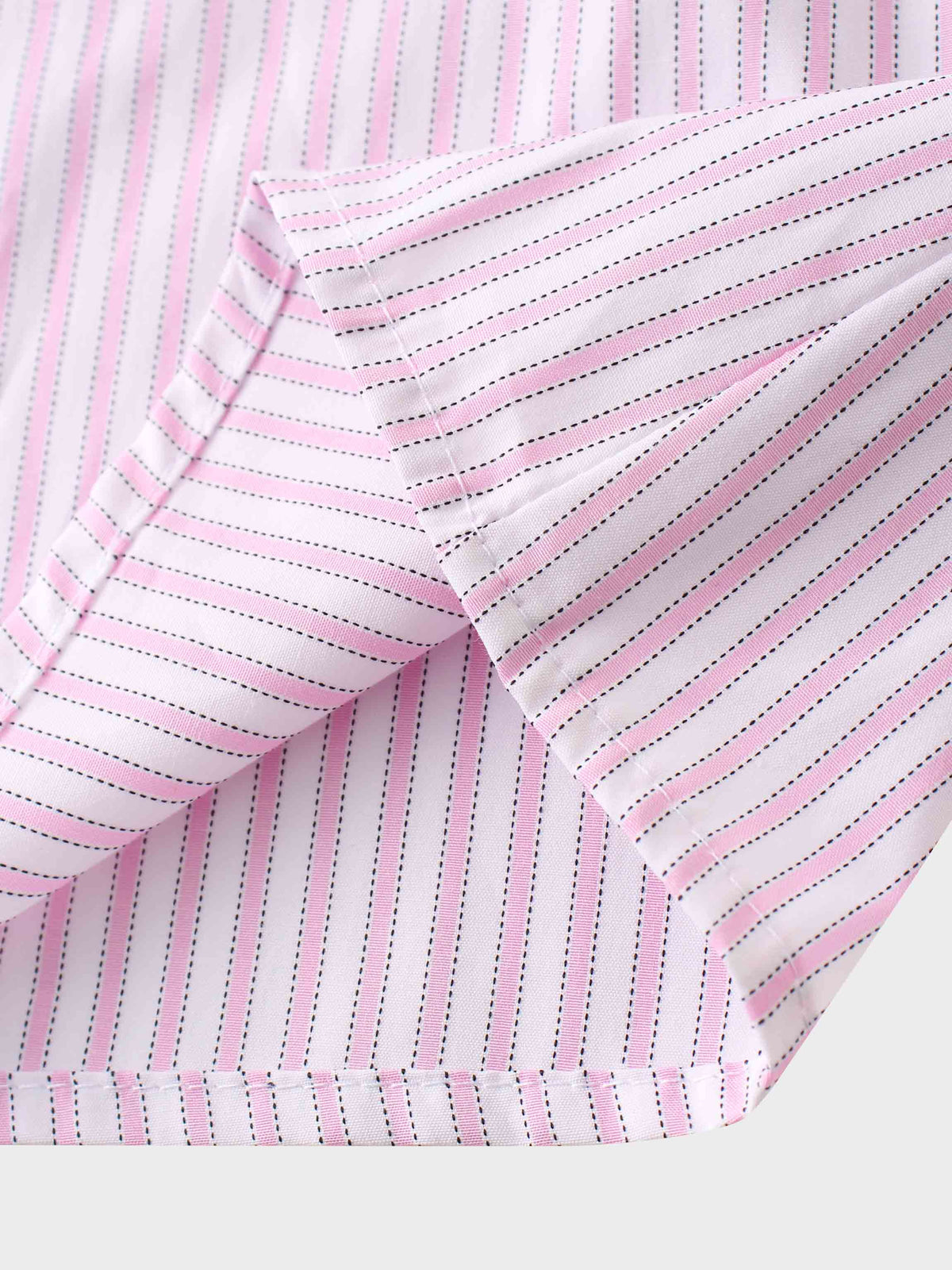 Striped Cotton Jumper-Pink fabric close-up, light pink and white stripes.