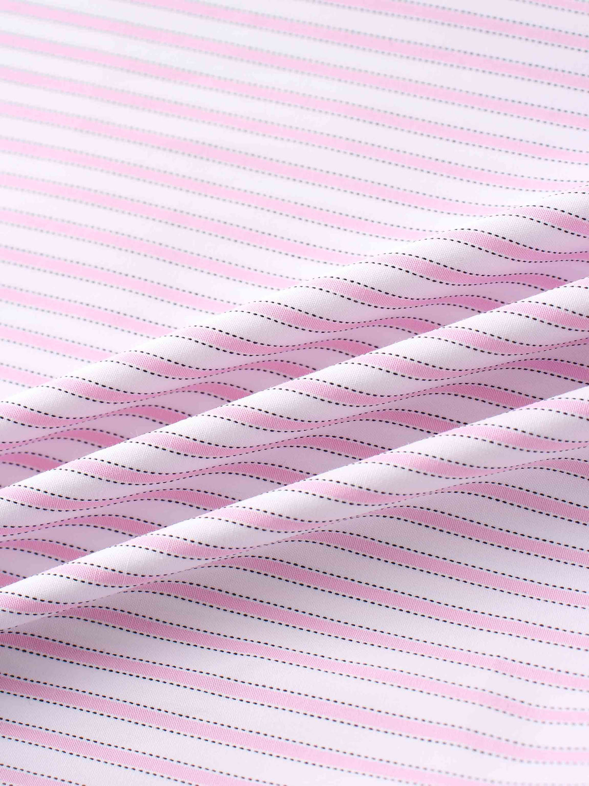 Close-up of light pink and white striped cotton fabric with small dashed black lines.
