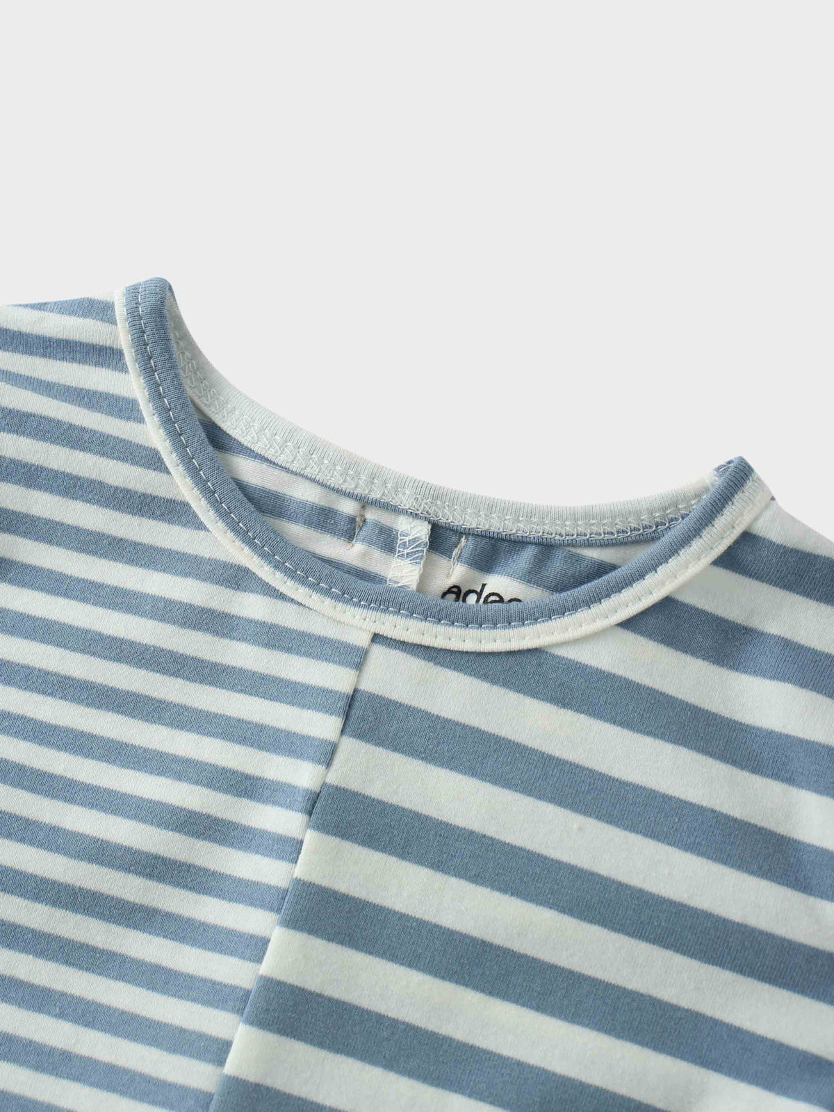 Light blue striped T-shirt neckline
