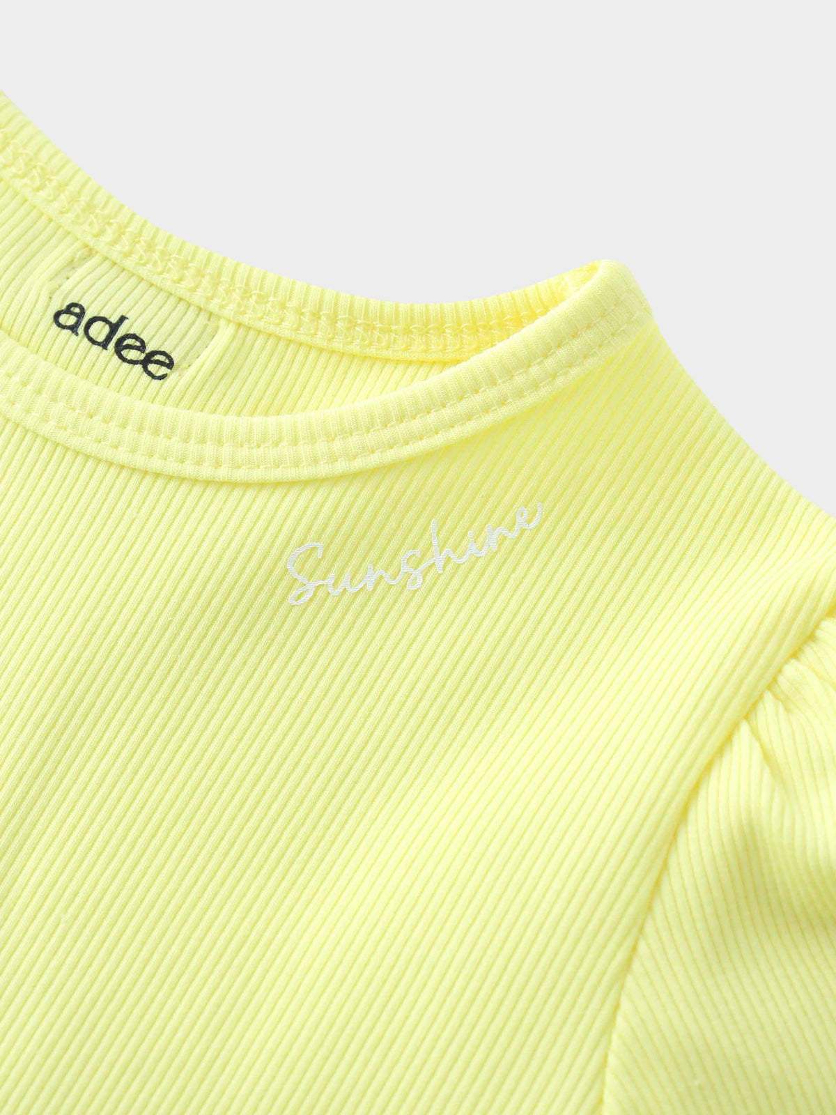 Yellow shirt with Sunshine lettering for girls