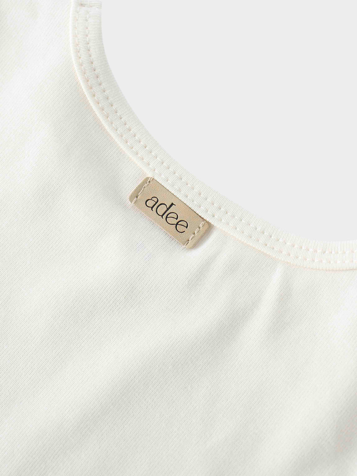 Close-up of off-white shirt