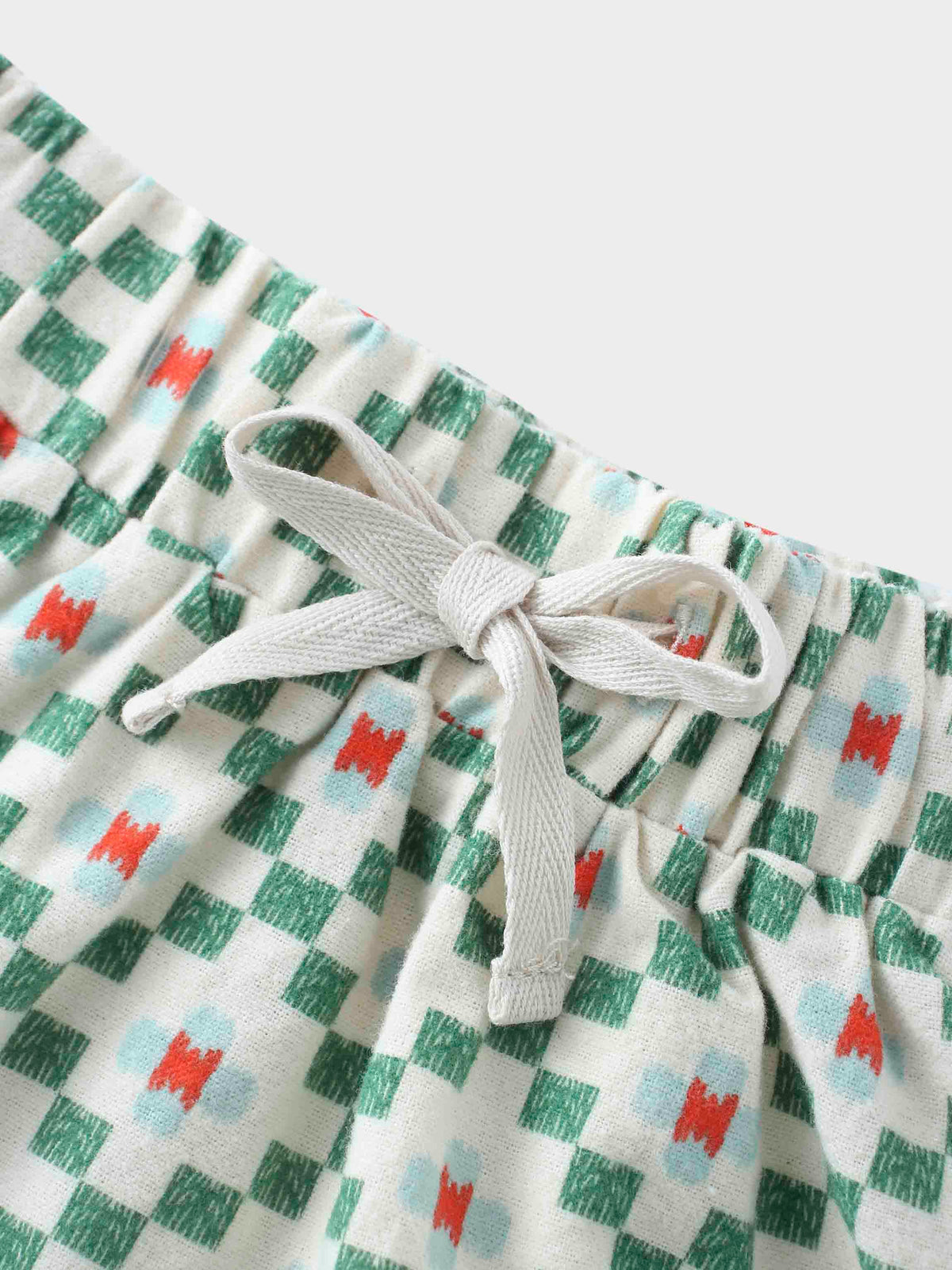 Green diamond skirt waistband detail
