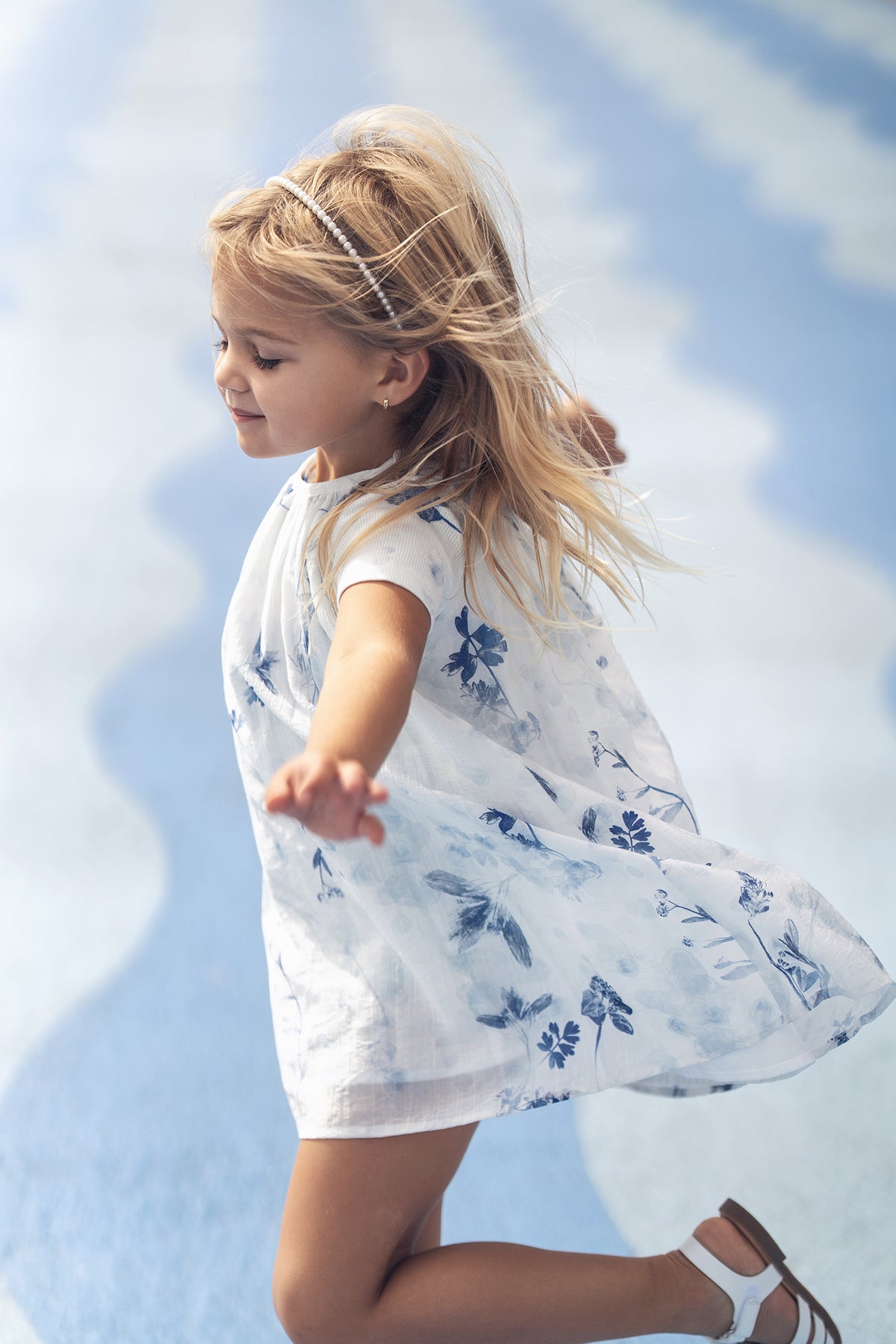 Blue flower jumper dress for girls, white fabric with blue floral print
