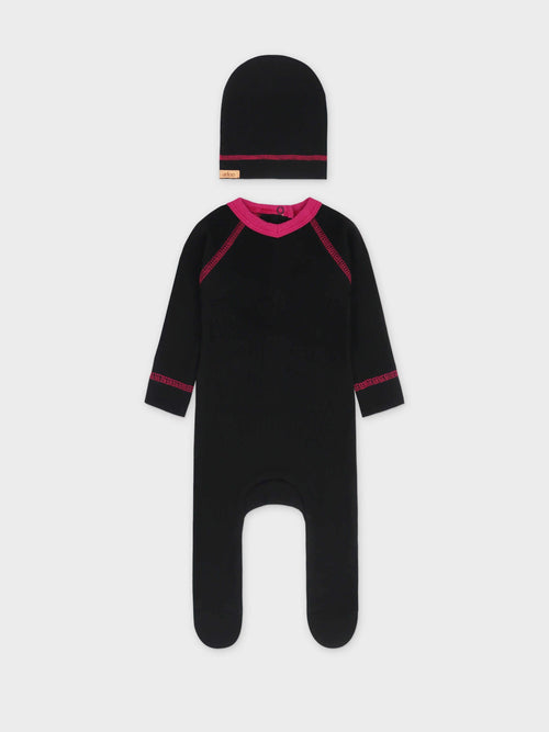 Baby jumpsuit with pink V-neck