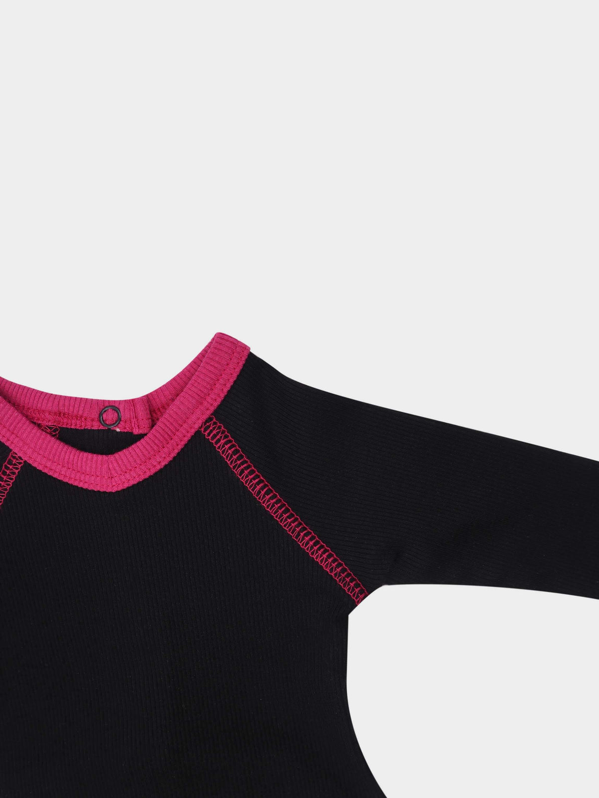 Baby jumpsuit with pink V-neck
