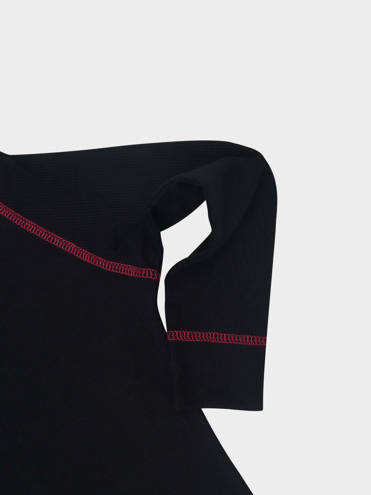 baby jumpsuit with pink stitching