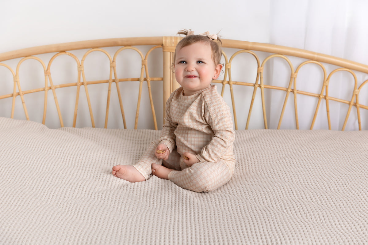 Pink Squared Pajamas for girls in beige-pink plaid.
