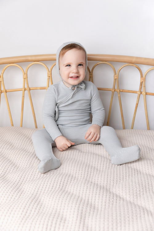 Blue Scalloped Stretchy Boys Stretchies set in light blue knit, with a hooded top and matching pants